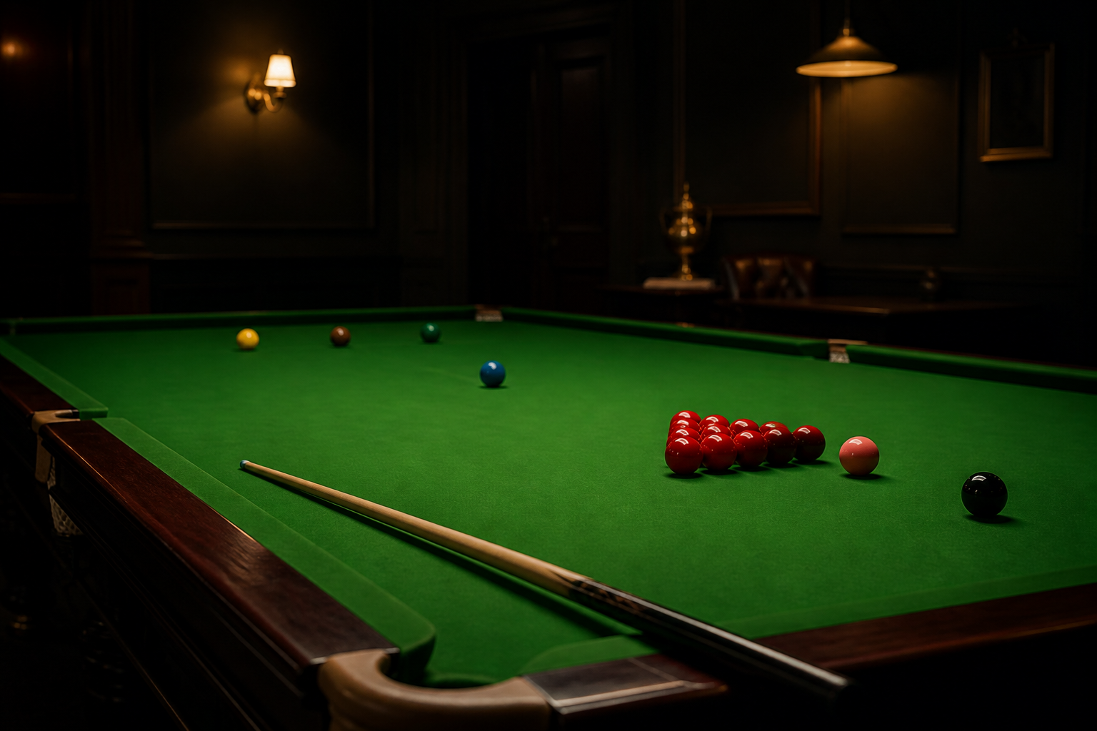 Snooker table prepared for play with a cue and balls